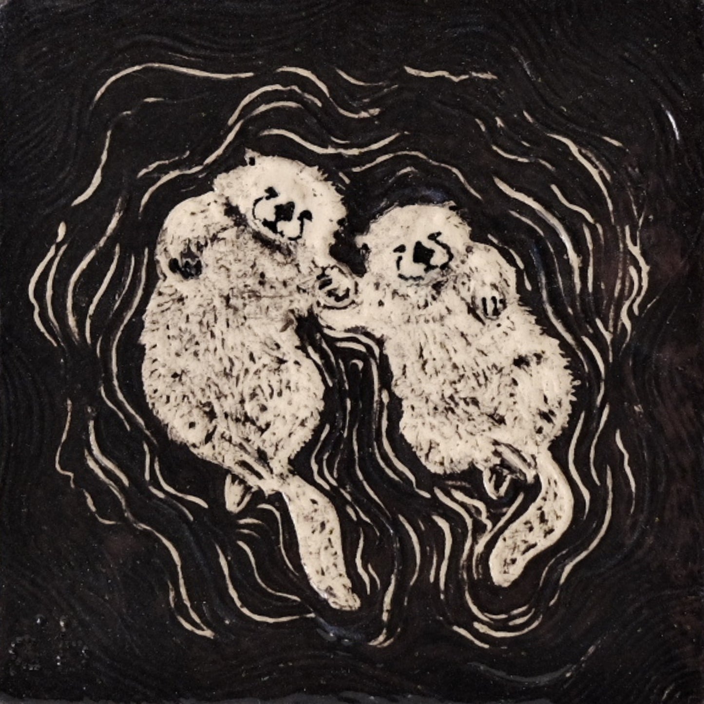 Otters Holding Hands