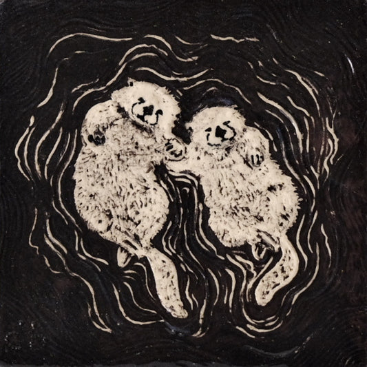 Otters Holding Hands