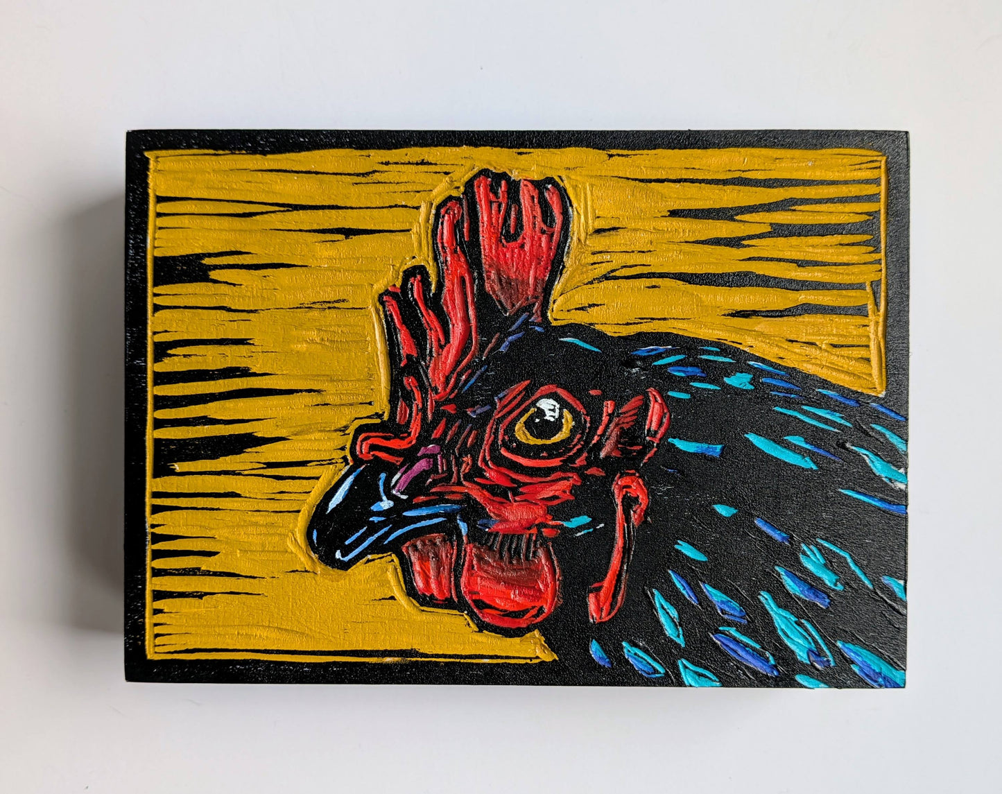 Cluck Norris carved in wood